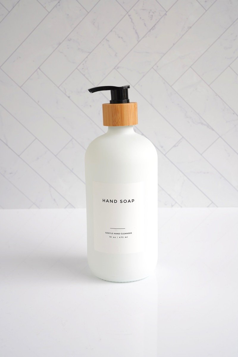 glass soap bottle with bamboo